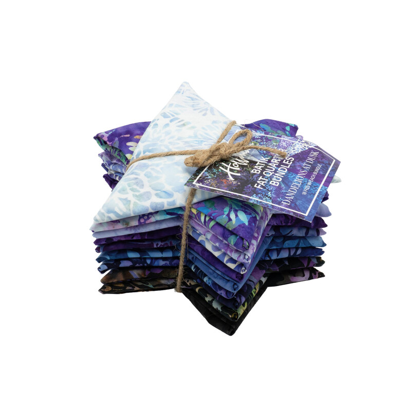 The Bali Batiks - Dandelions At Dusk Fat Quarter Bundle in its star shaped packaging, isolated on a white background.