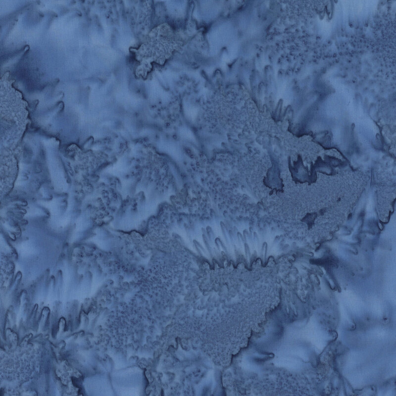 Cerulean blue batik fabric featuring a mottled watercolor design.