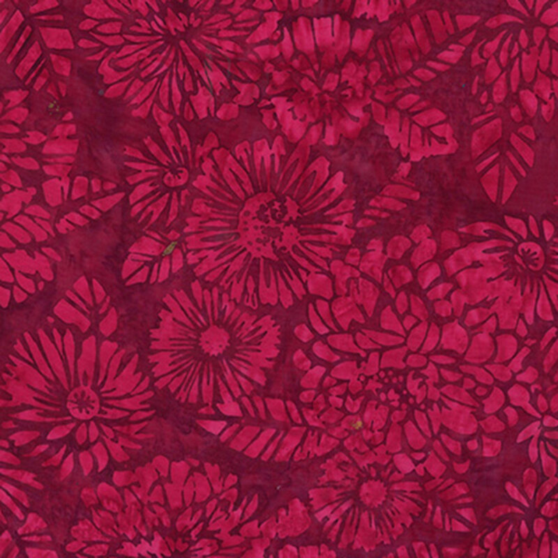 A tonal rose red floral and leaf silhouettes tossed on a red fabric.