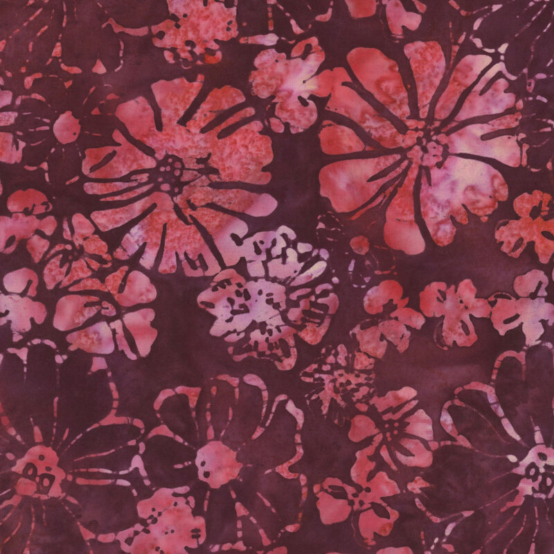 Mottled pink flowers tossed on a mottled magenta fabric.