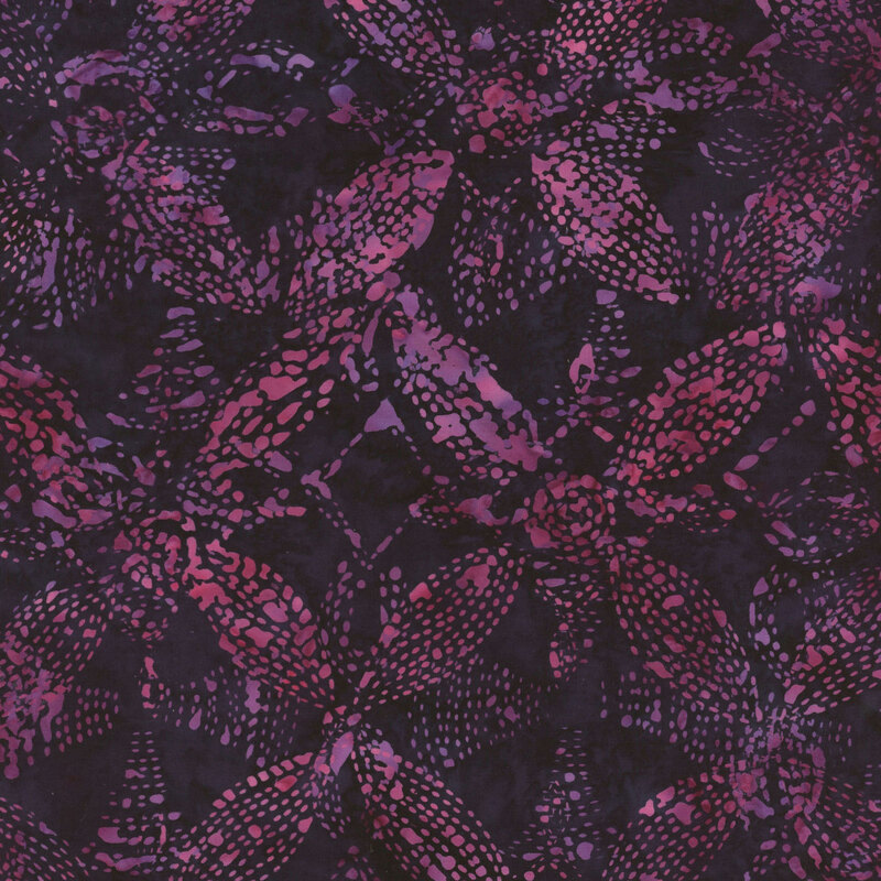 Mottled rose red and purple flower pattern on a black fabric.