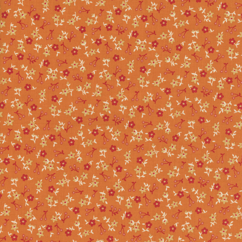 Carrot orange fabric with a calico tonal, red, and white floral design.