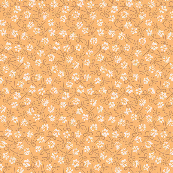 Light orange fabric with a white floral and tonal bow design.