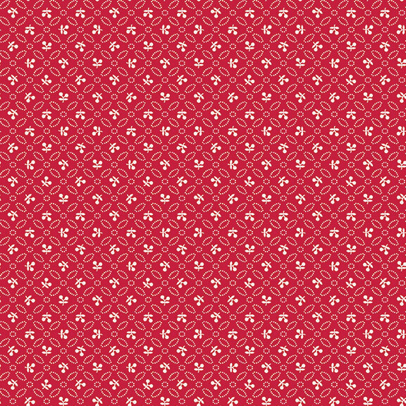 Rose red fabric with uniform rows of orange leaves and white sprigs.