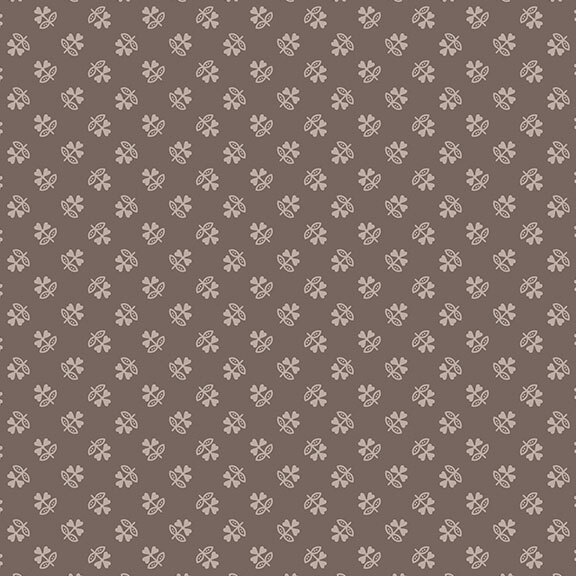 Warm gray fabric with a tonal ditsy pattern of stylized clovers.