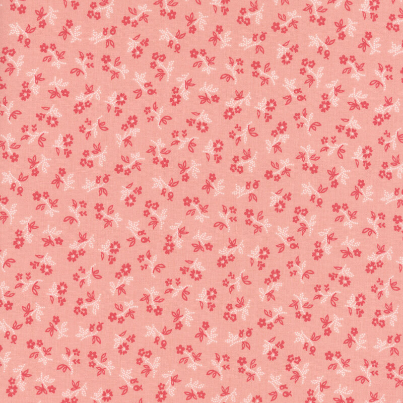 Pink fabric with a floral design.
