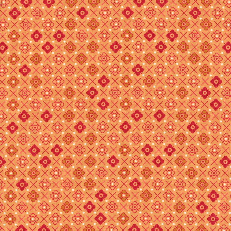 Orange fabric with a orange tonal floral emblem pattern.