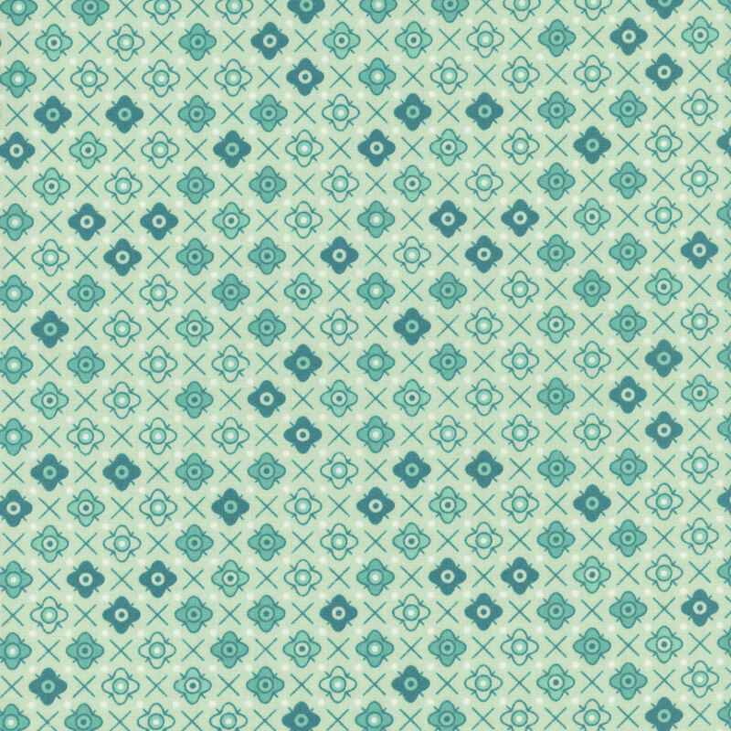 Aqua fabric with a teal tonal floral emblem pattern.