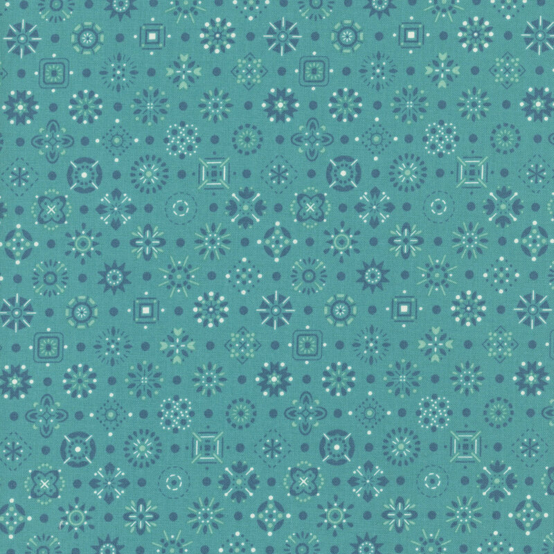 Rich teal fabric with a tonal, white, and blue design of scattered emblems.