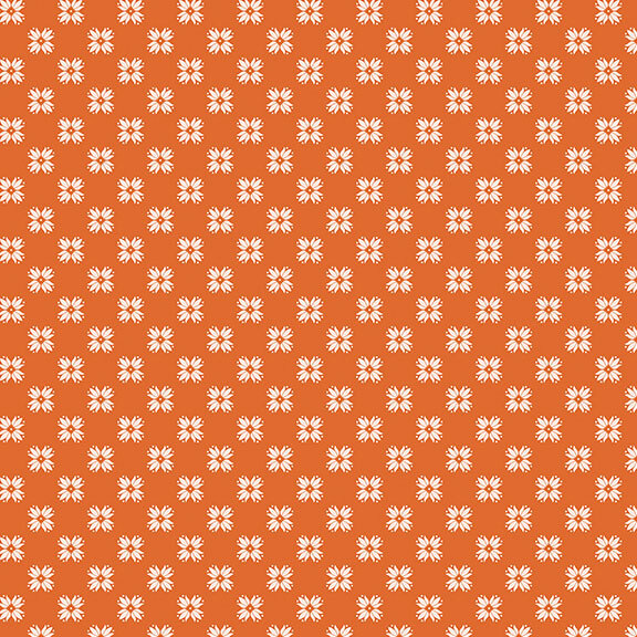 Orange fabric with a uniform white floral emblem design.