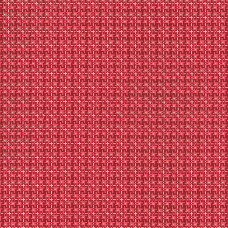 Cherry red fabric with a dynamic geometric pattern in tonal red and white.