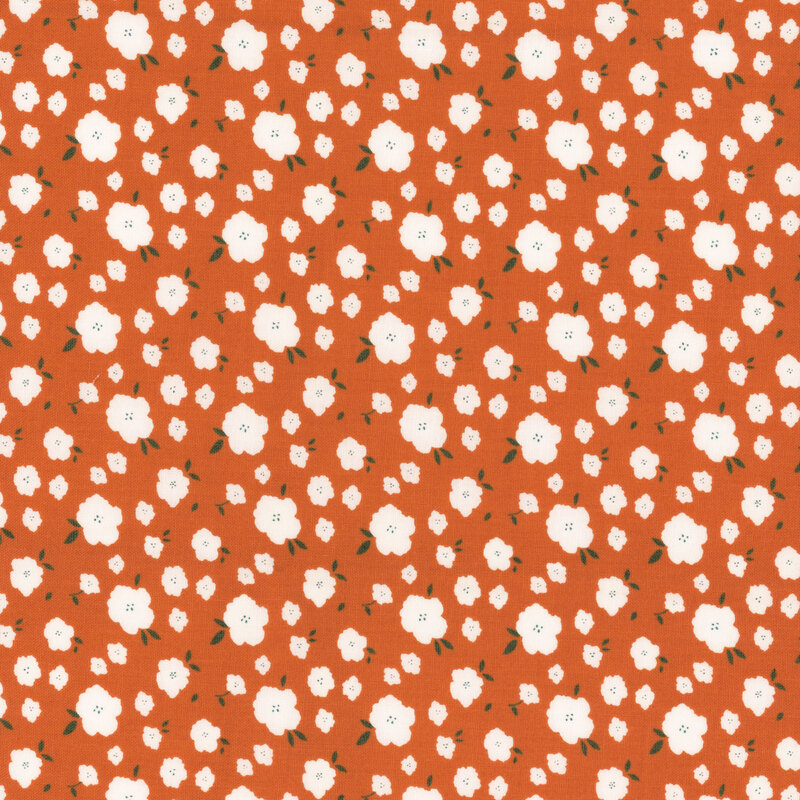 Bright orange fabric with tossed white flowers.