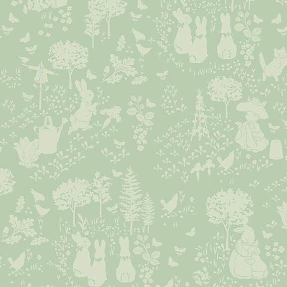Tonal green fabric featuring rabbits and trees in an outdoor garden.