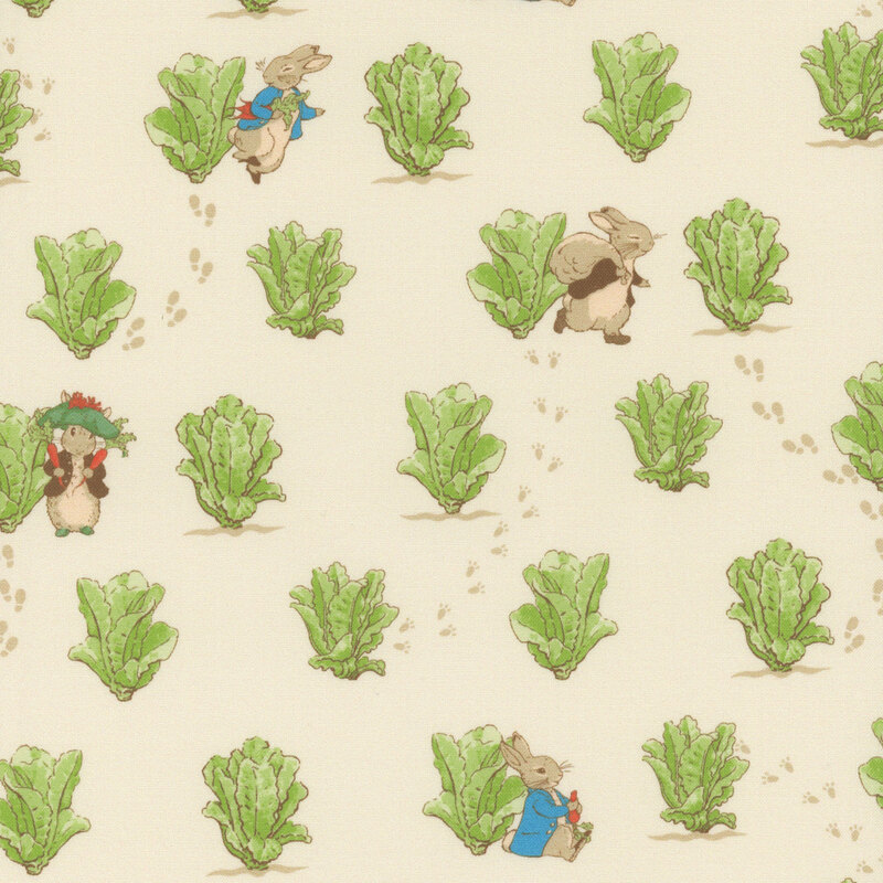 Storybook rabbits, Peter and Benjamin, are surrounded by the garden lettuce on cream fabric.