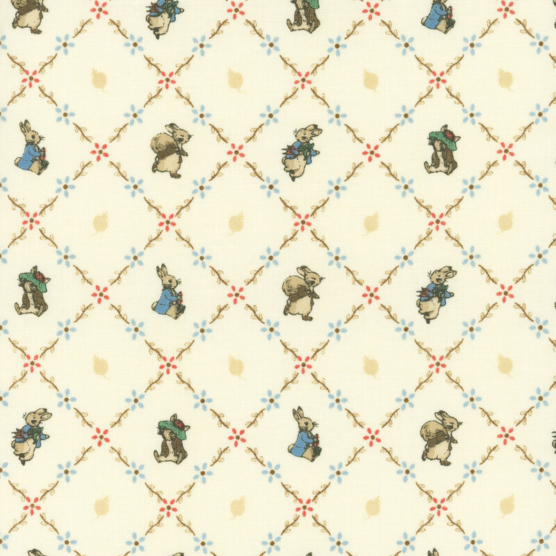 The storybook rabbits, Peter and Benjamin, pose inside floral lattice on cream fabric.