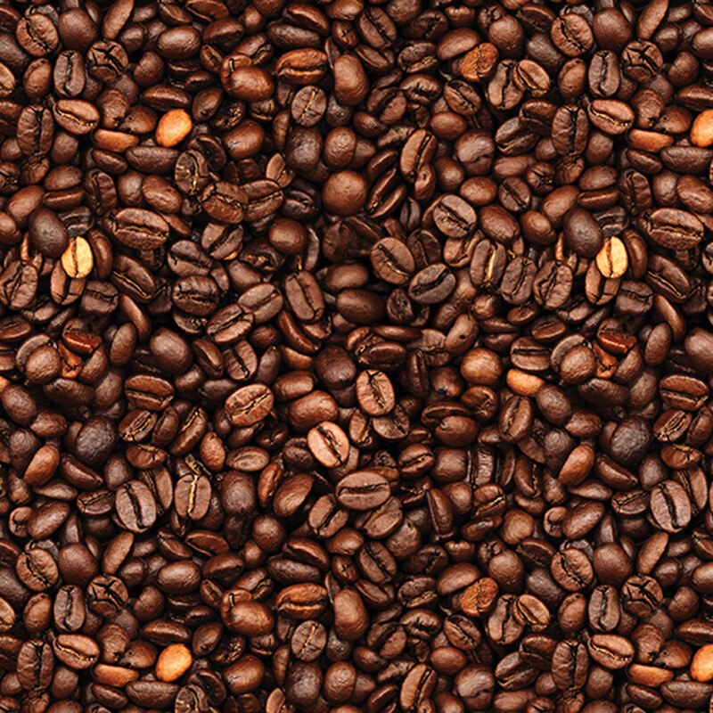 Close-up of a textured surface covered with various roasted coffee beans in rich brown tones.