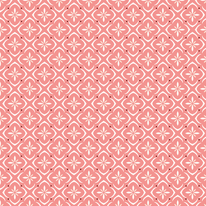 Coral pink fabric with a white and tonal tiled floral medallion pattern.