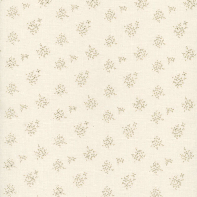 Cream fabric with tonal floral clusters.