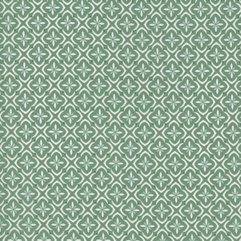Teal green fabric with a white and tonal tiled floral medallion pattern.