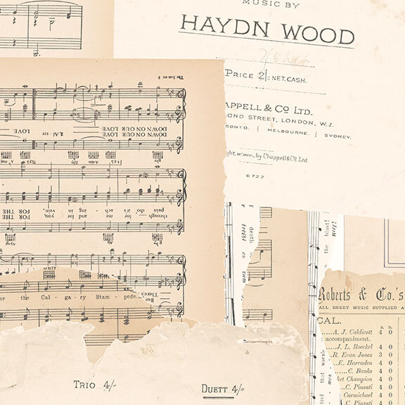 Fabric featuring vintage sheet music in cream and beige