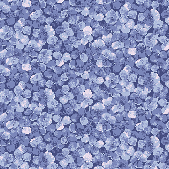Periwinkle blue fabric with a packed hydrangea flower motif.