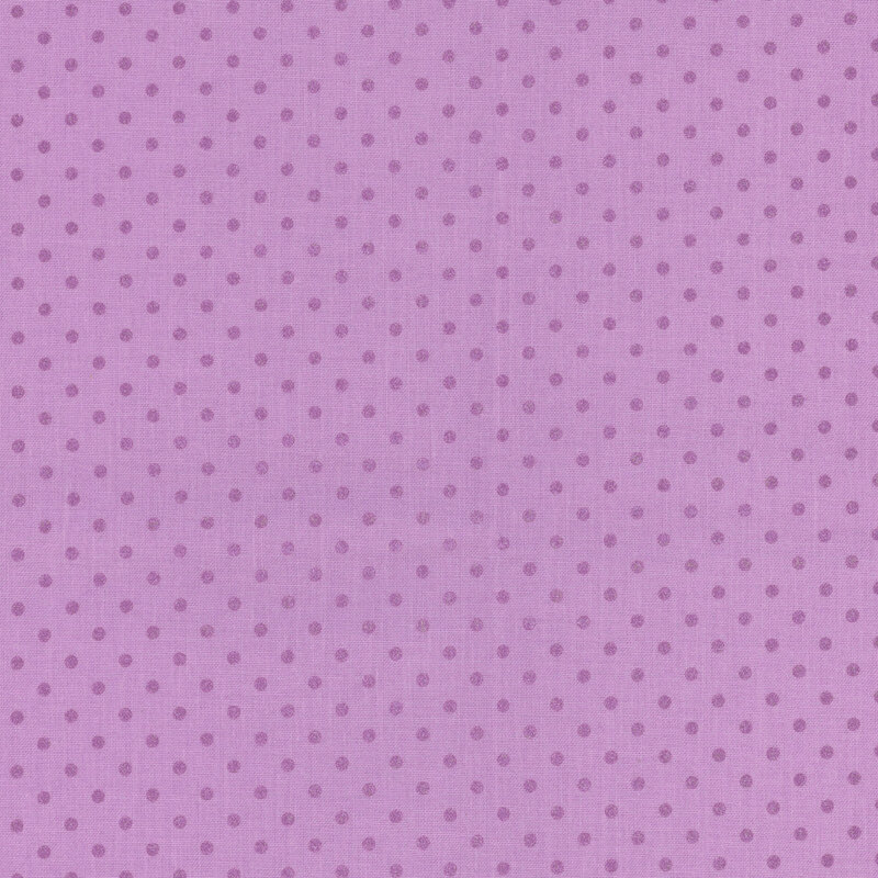 Violet purple fabric with tonal polka dots.