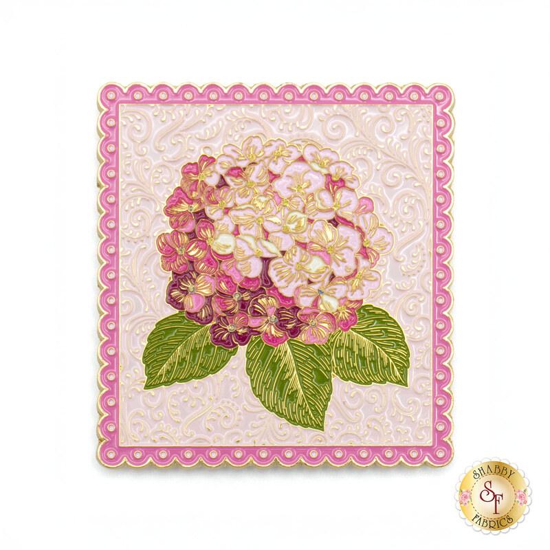 Pink hydrangea needle minder with gold accents.