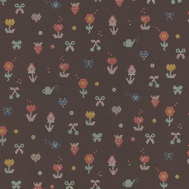 A dark fabric pattern featuring small, colorful flowers and bows arranged in a repeated design.