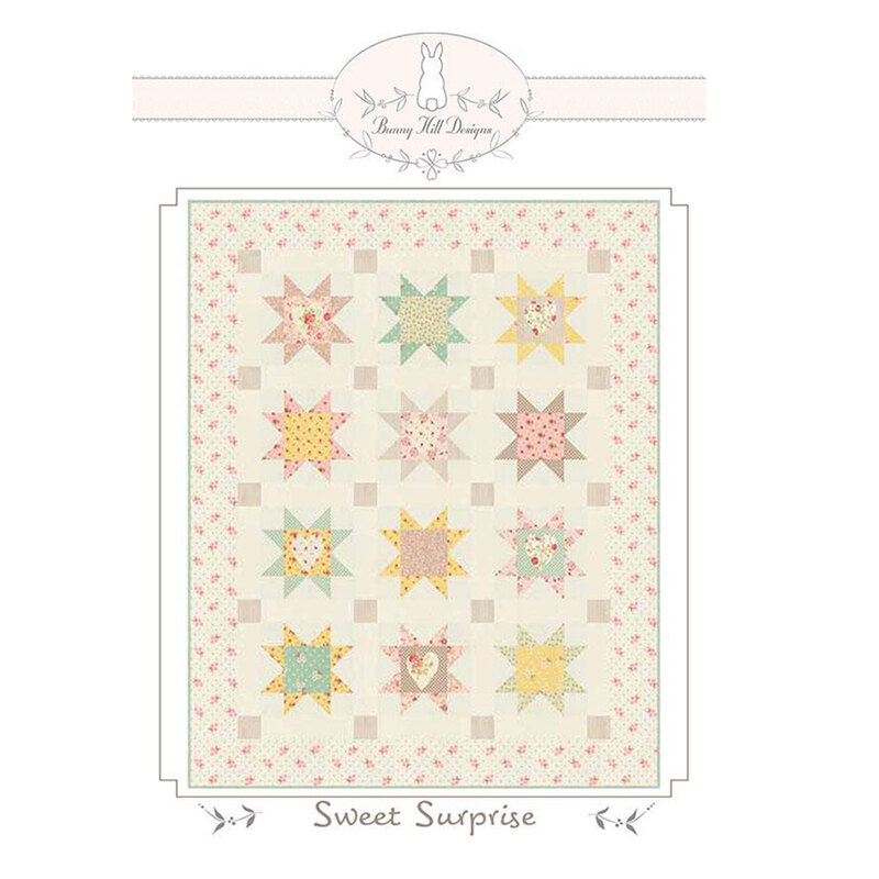 Front cover of the pattern showing the completed Quilt project and the Bunny Hill Logo.