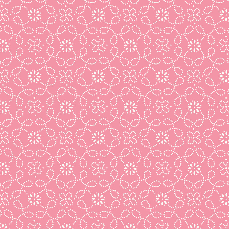 A pink patterned background featuring white floral designs and swirling lines.