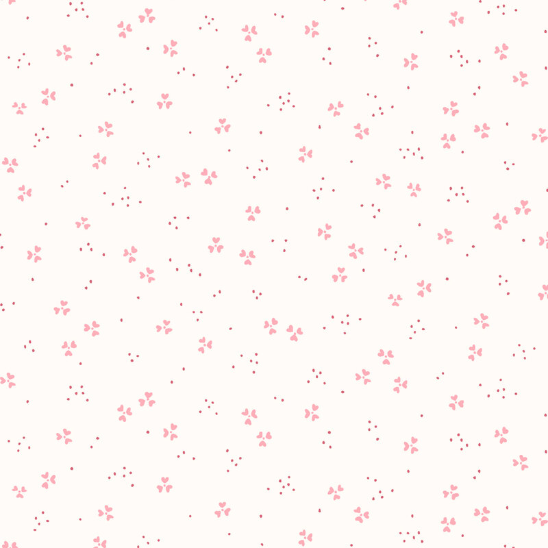 A light cream background with scattered pink floral patterns and small red dots.