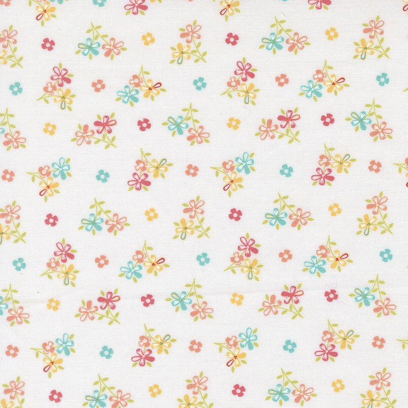 White fabric with scattered multicolor bouquets and flower blossoms. 