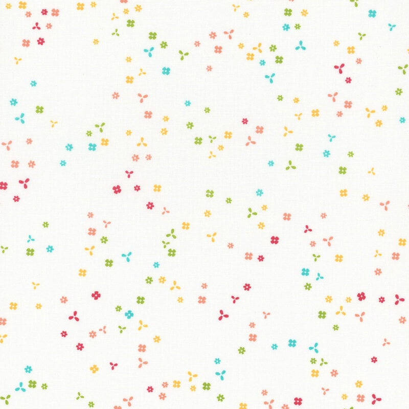 White fabric with scattered, tiny multicolor flower blossoms.