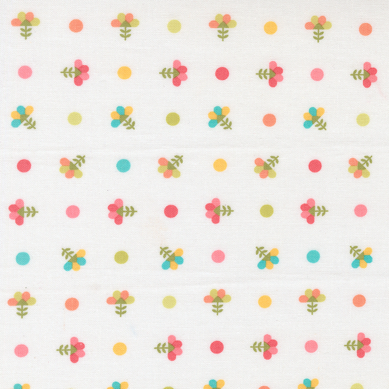 White fabric with colorful polka dots and ditsy florals.