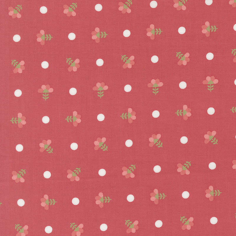 Strawberry red fabric with white polka dots and ditsy florals.