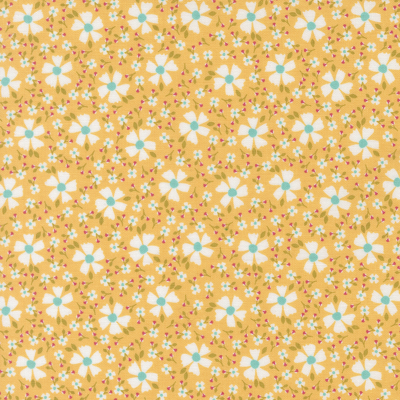Golden yellow fabric with white florals and smaller blossoms scattered between.