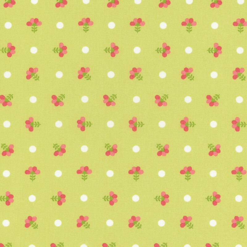 Lime green fabric with white polka dots and ditsy florals.