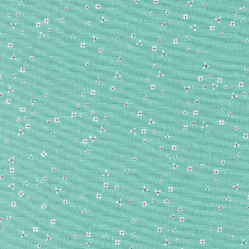 Aqua fabric with scattered, tiny white flower blossoms.