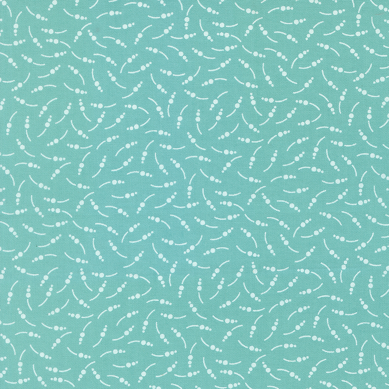 Aqua fabric with abstract dots and lines scattered across the design.