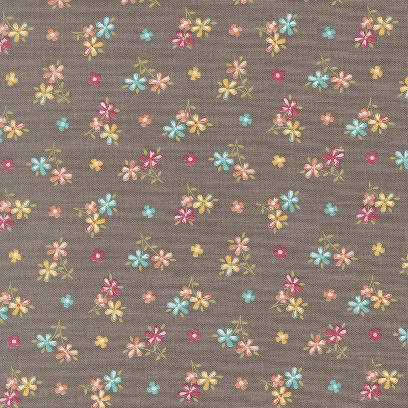 Stone gray fabric with scattered multicolor bouquets and flower blossoms. 