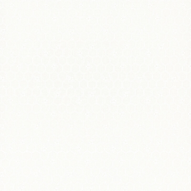 White on white fabric featuring a Honeycomb pattern with bees