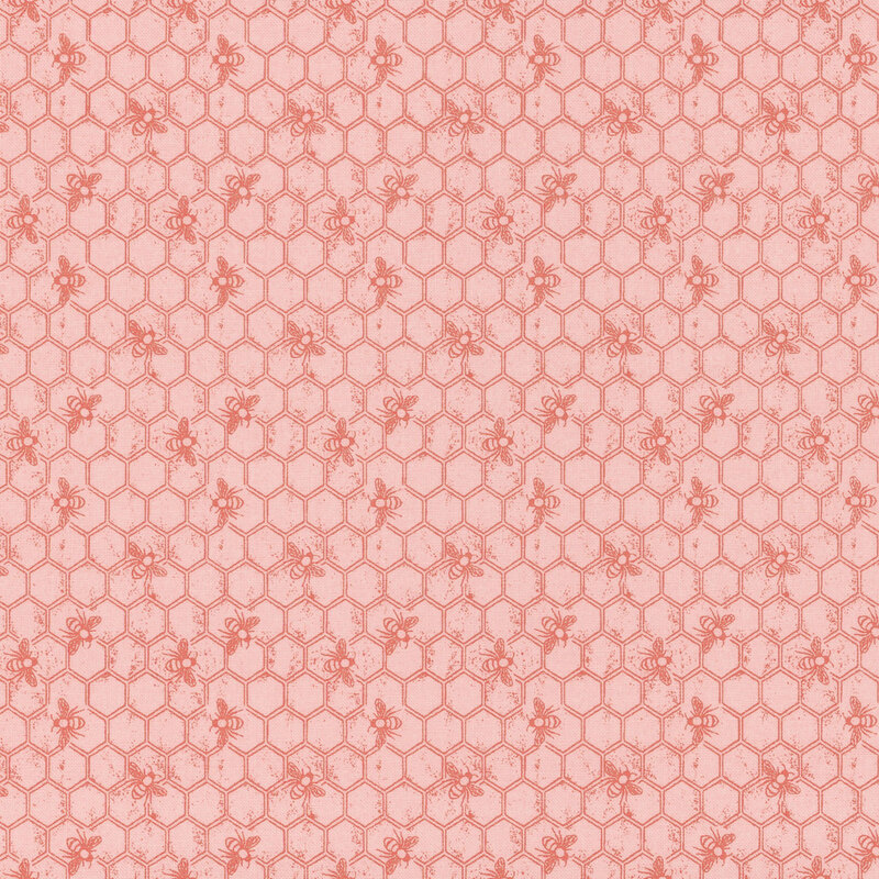 Tonal pink fabric featuring a Honeycomb pattern with bees