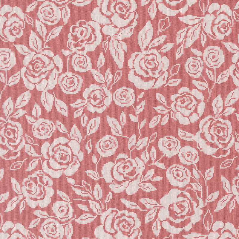 Pink fabric featuring a pixelated design of cream roses