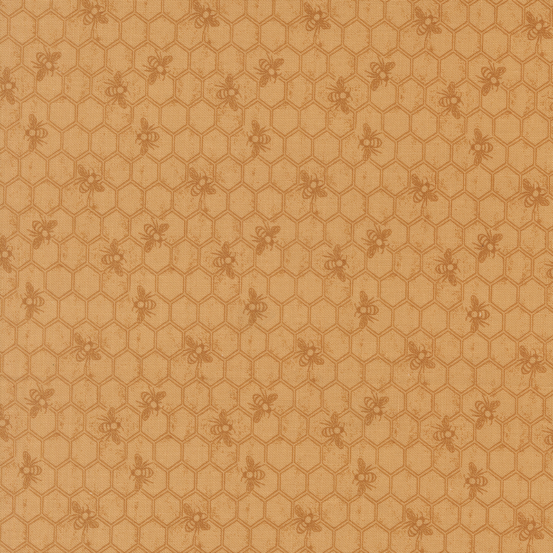 Tonal golden yellow fabric featuring a Honeycomb pattern with bees
