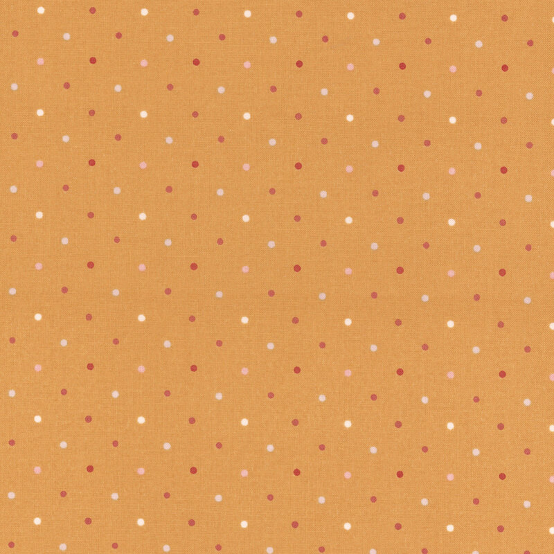 Orange fabric with a white, pink, light gray and red polka dot pattern.