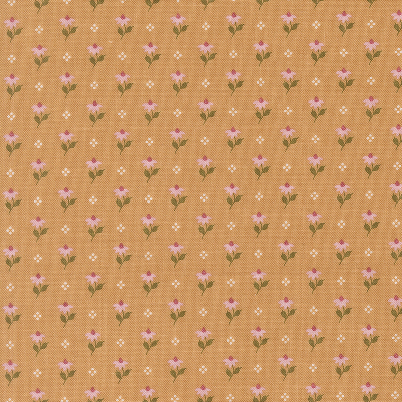Golden yellow fabric featuring a pattern of pink flowers and white dots.