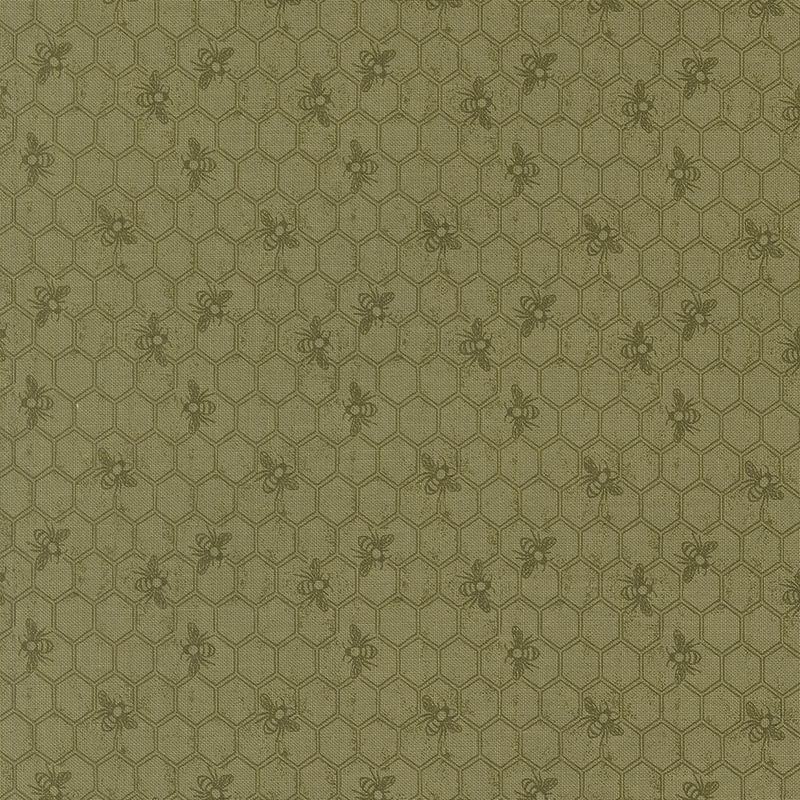 Tonal olive green fabric featuring a Honeycomb pattern with bees