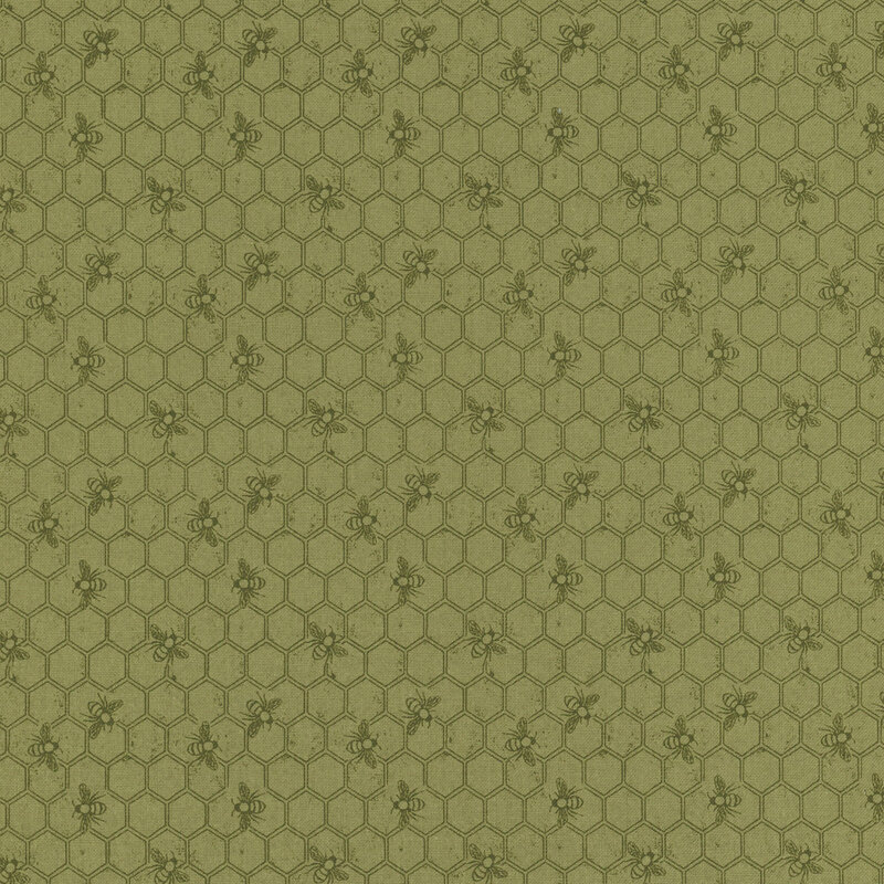 Tonal olive green fabric featuring a Honeycomb pattern with bees