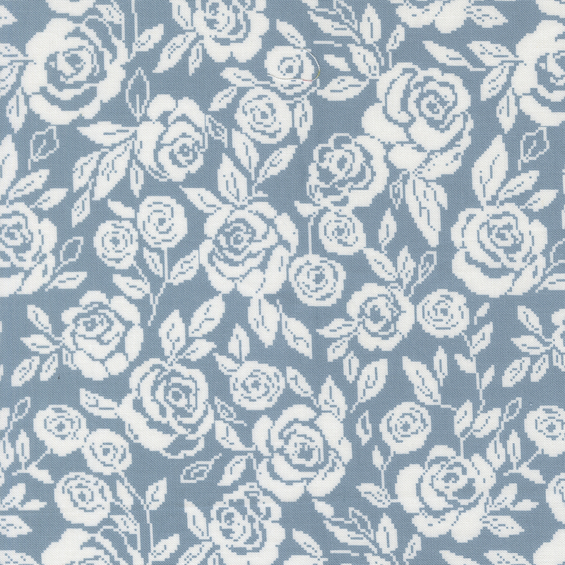 Light blue fabric featuring a pixelated design of cream roses