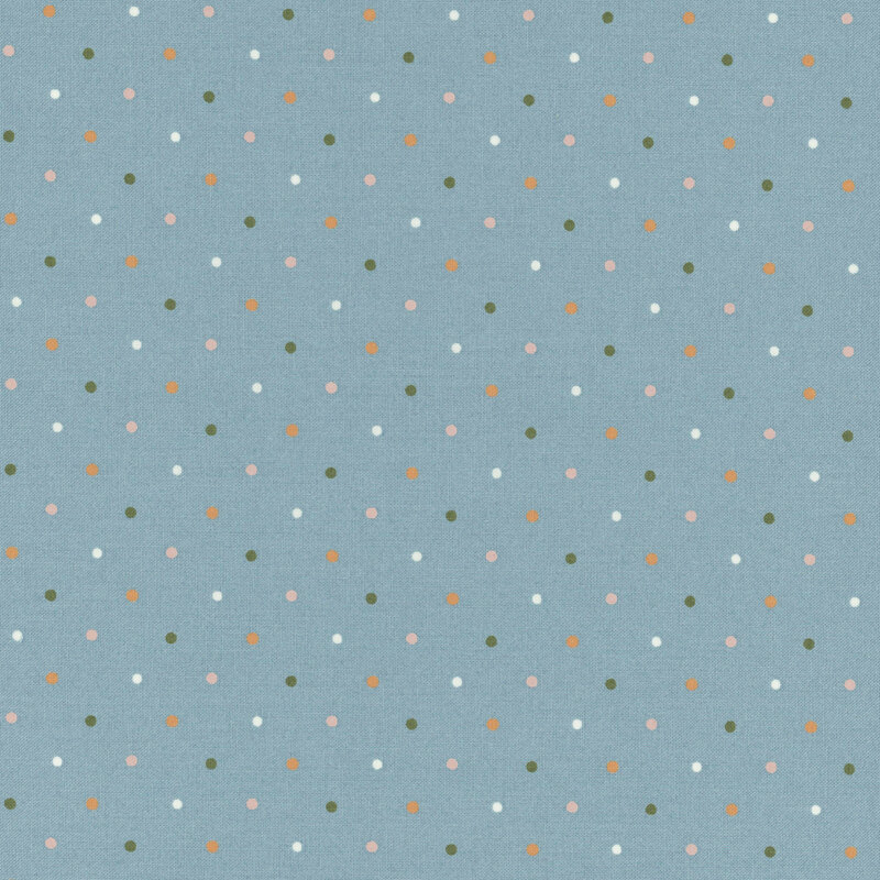 Blue fabric with a white, yellow, green and pink polka dot pattern.